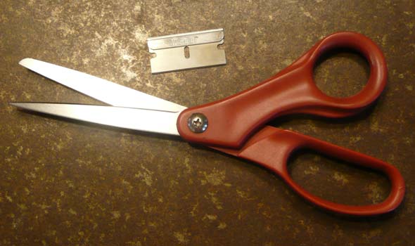 tools of the ultralight trade - scissors and single-edge razor blade